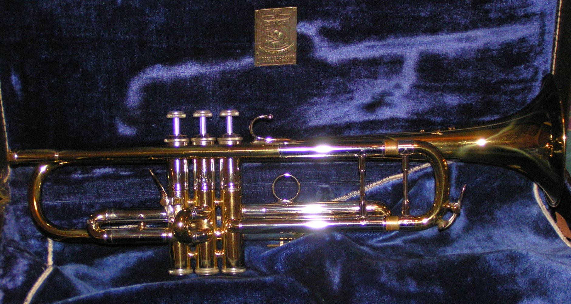 Vincent Bach trumpet arranged in its open case